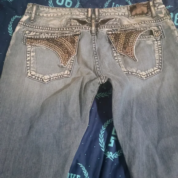 Women's Distressed Blue Jeans